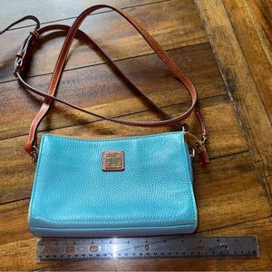 Dooney & Bourke crossbody bag. Teal. Good condition.